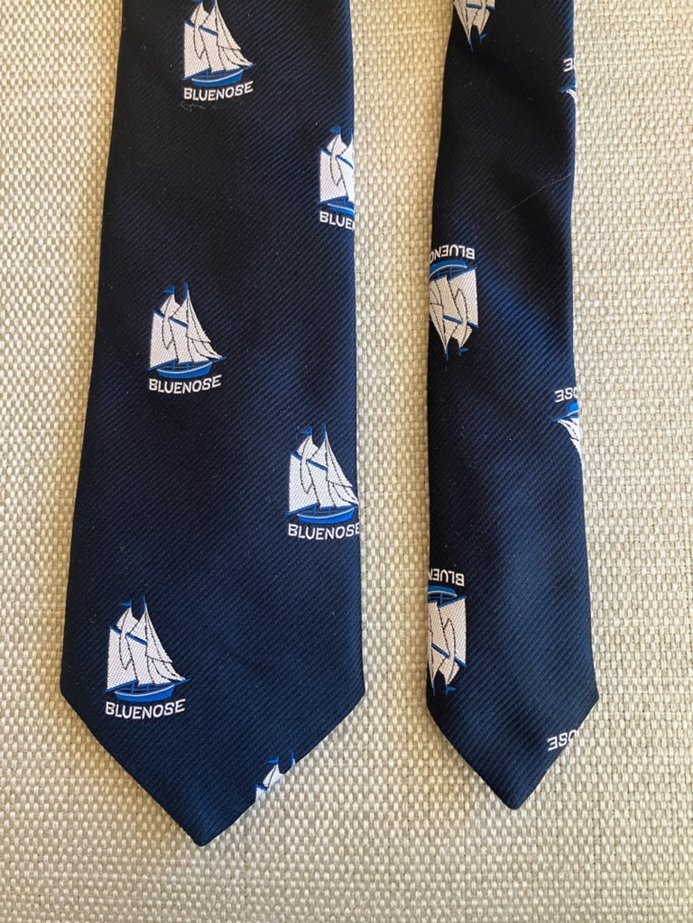 Vintage men’s tie “Bluenose” schooner sailing ship motif navy blue & white